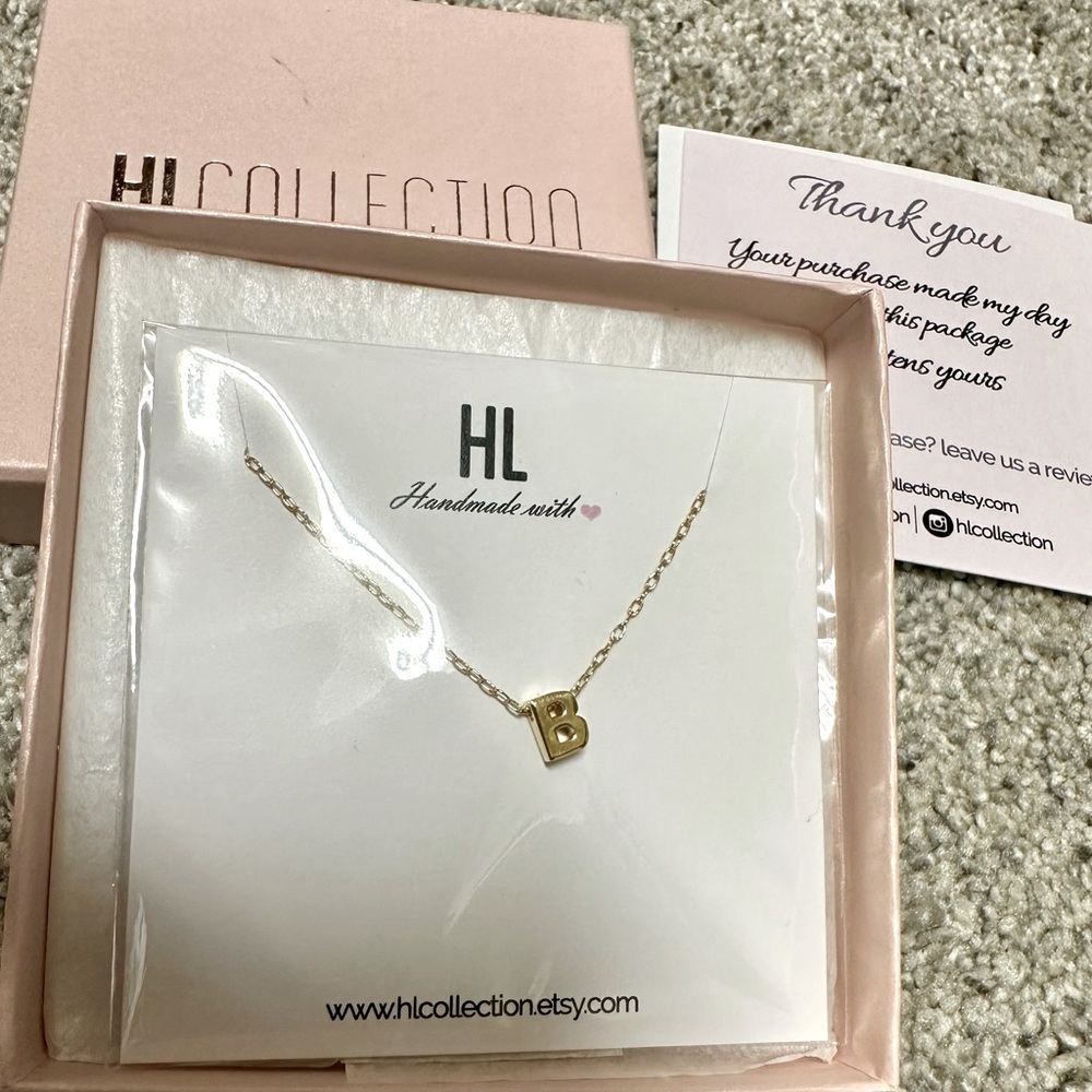 Tiny gold colored necklace with B initial. Brand new from HLCollection/Etsy